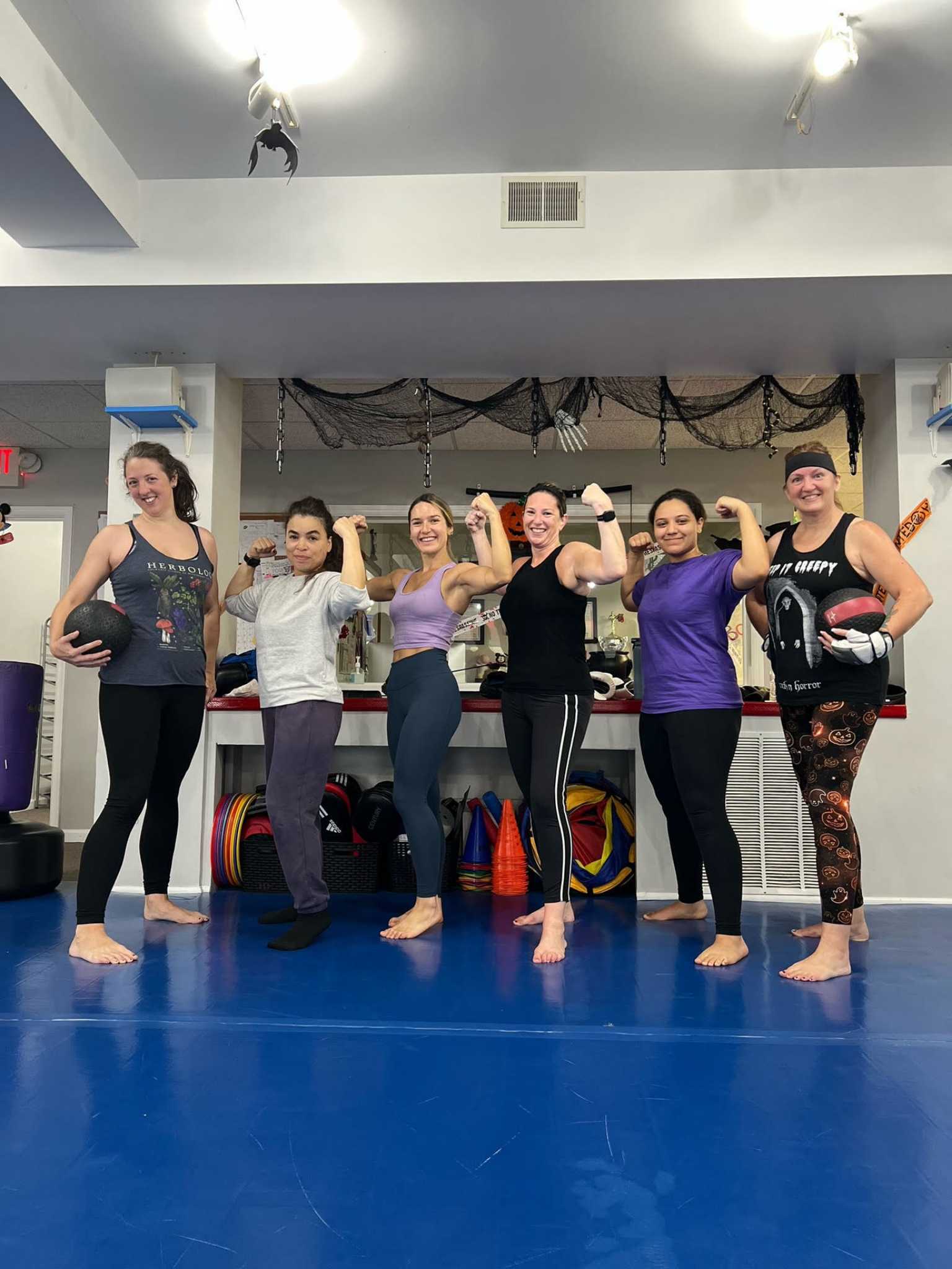 Bloom and Thrive in Body & Spirit Through Kickboxing!